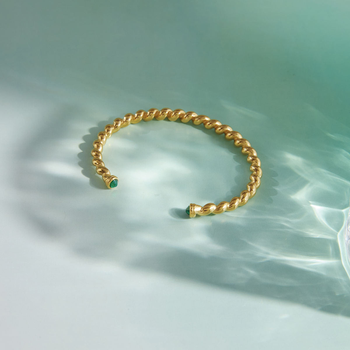 Green Zirconias Twisted Cuff Bracelet