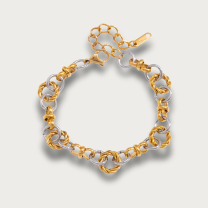 Pulsera de cadena con eslabones circulares retorcidos en dos tonos