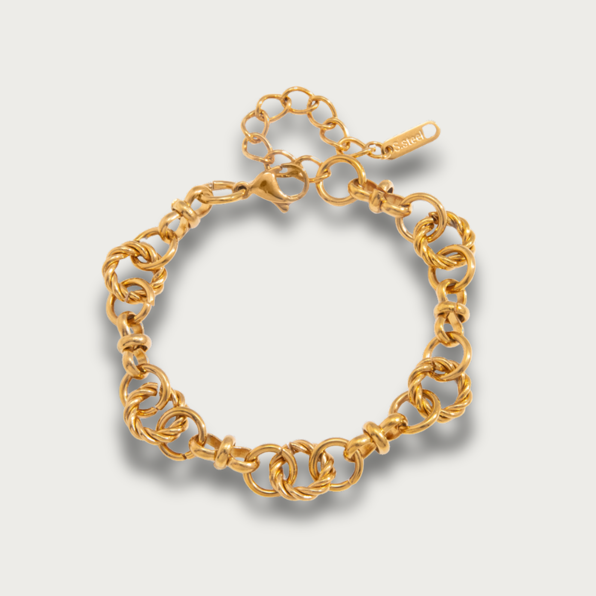 Pulsera de cadena dorada con eslabones circulares retorcidos