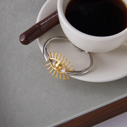 Two Tone Eye Bangle Bracelet
